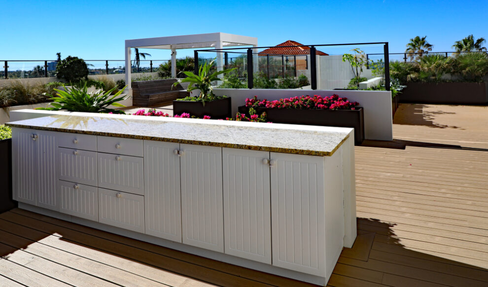 Beautiful,Granite,Countertop,On,A,White,Cabinet,Located,On,An